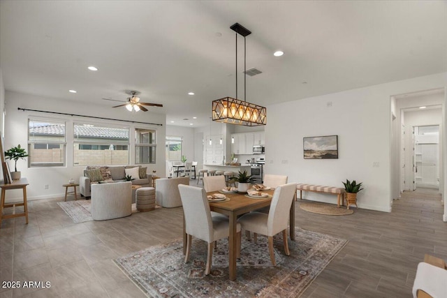 dining area featuring recessed lighting, visible vents, baseboards, and a ceiling fan