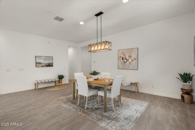 dining space featuring recessed lighting, visible vents, baseboards, and wood finished floors