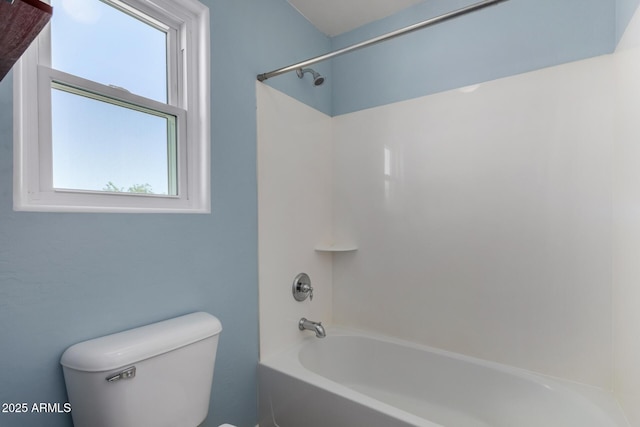 full bathroom with bathing tub / shower combination and toilet