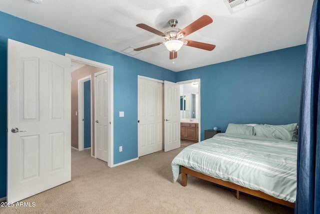 bedroom featuring light colored carpet, baseboards, visible vents, and a ceiling fan