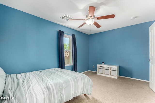 bedroom with ceiling fan, visible vents, baseboards, and carpet