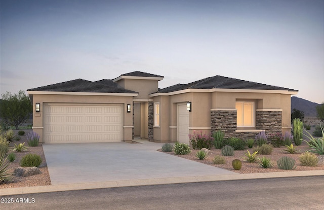 18225 E Colt Dr, Queen Creek, AZ 85142 - prairie-style house with a garage, concrete driveway, stucco siding, and stone siding