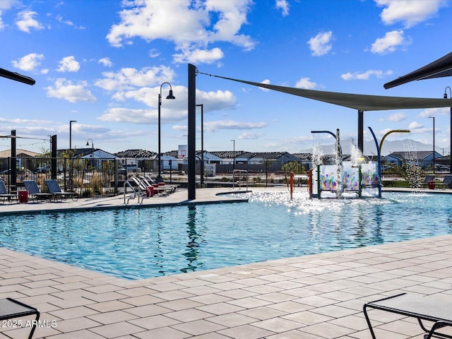 view of swimming pool featuring a patio area and pool water feature