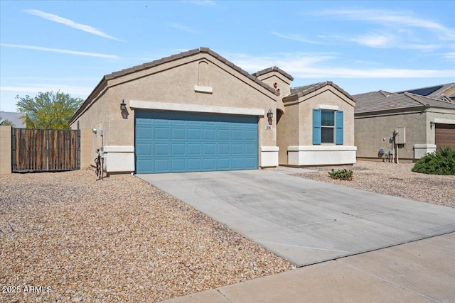 ranch-style house with an attached garage, a tiled roof, driveway, and stucco siding