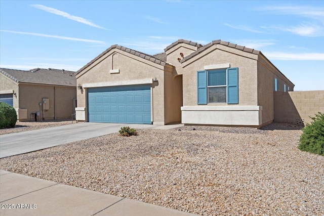 ranch-style home featuring fence, a garage, stucco siding, and concrete driveway