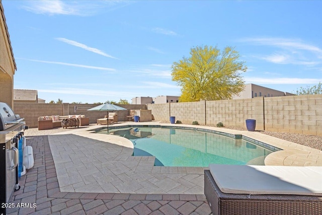 view of swimming pool with a fenced in pool, a patio, outdoor lounge area, and a fenced backyard