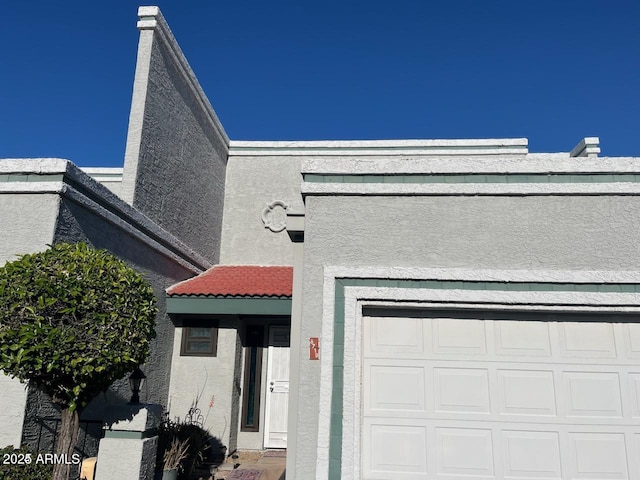 exterior space featuring a garage