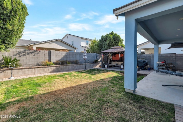 view of yard with a gazebo and a patio