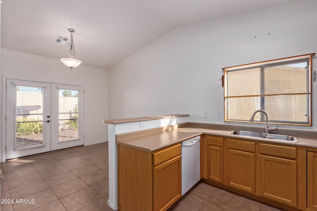 kitchen featuring lofted ceiling, dishwasher, sink, french doors, and decorative light fixtures