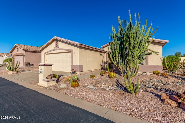 view of front of property featuring a garage