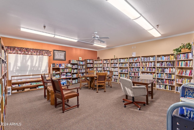 interior space featuring ornamental molding and carpet floors