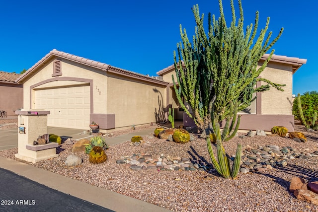 view of front of home with a garage