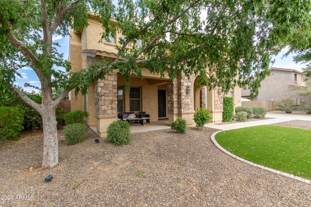 view of front of property with a patio