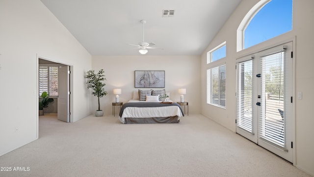 bedroom with visible vents, high vaulted ceiling, carpet flooring, and access to outside