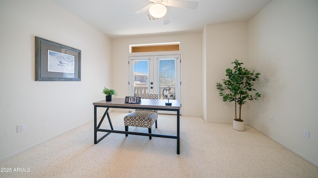 home office with visible vents, speckled floor, and ceiling fan