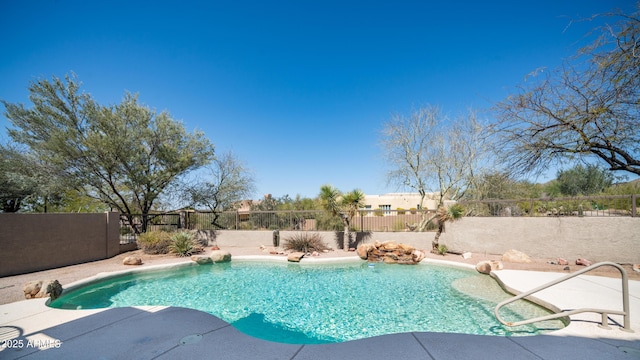 view of pool with a patio, a fenced backyard, and a fenced in pool