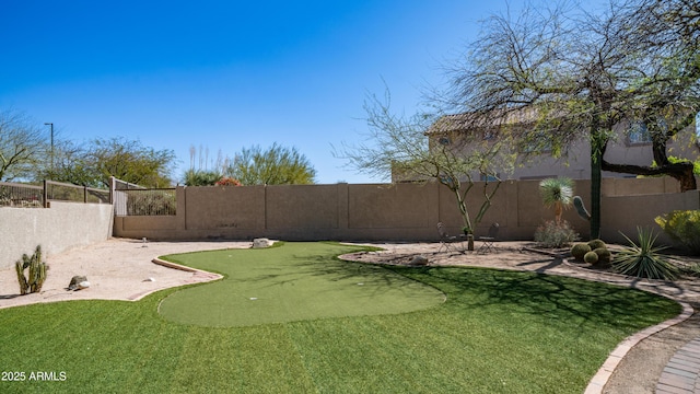 view of yard featuring a fenced backyard