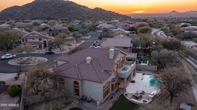 bird's eye view with a mountain view and a residential view