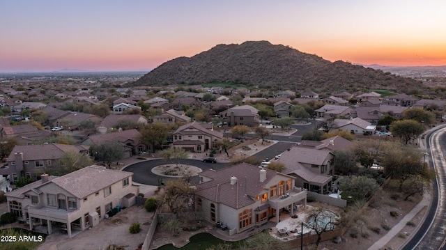 aerial view featuring a mountain view and a residential view