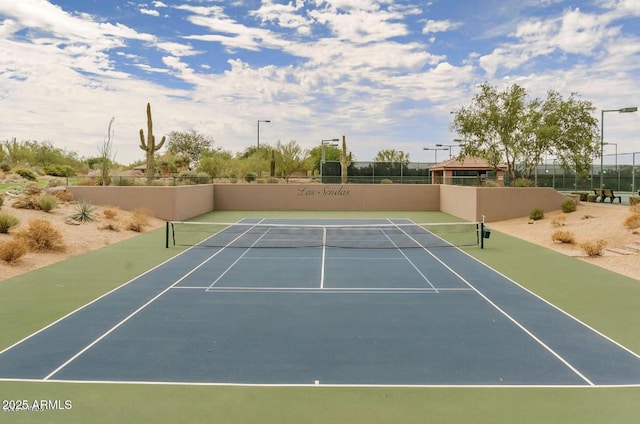 view of sport court featuring community basketball court and fence