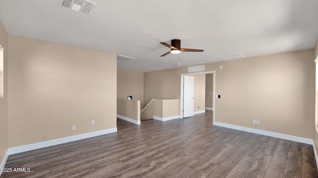 unfurnished room featuring ceiling fan and dark hardwood / wood-style flooring