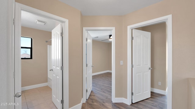 corridor featuring light wood-type flooring