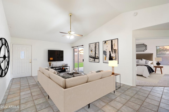 tiled living room with plenty of natural light, lofted ceiling, and ceiling fan