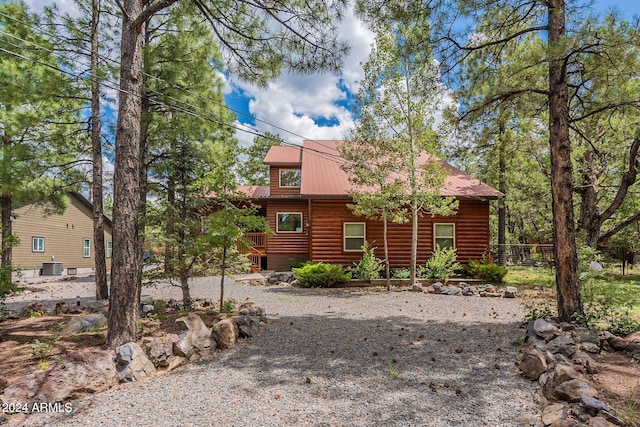 view of log cabin