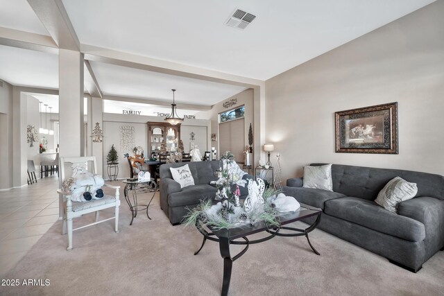 living room featuring light tile patterned flooring