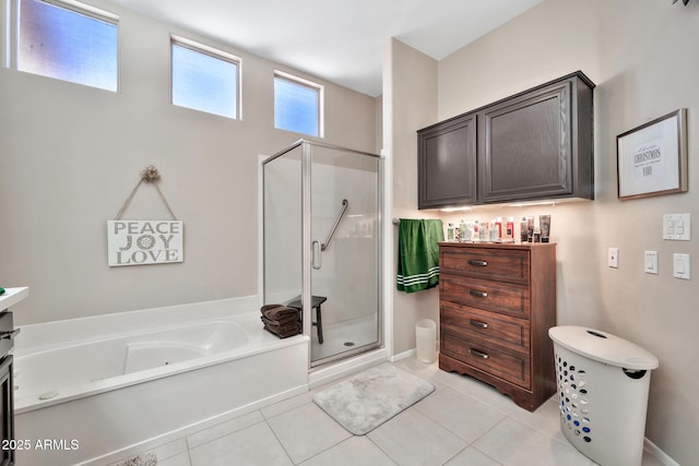 bathroom with tile patterned floors, vanity, and independent shower and bath