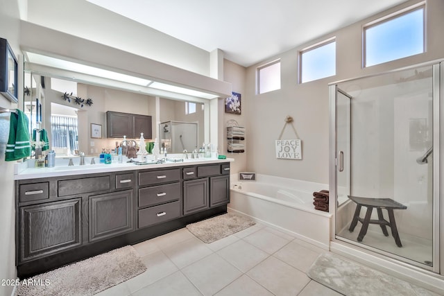 bathroom featuring tile patterned floors, vanity, and independent shower and bath