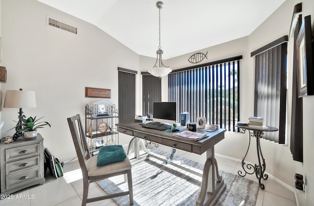 tiled office with lofted ceiling