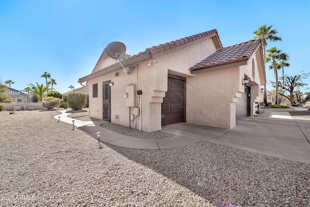 view of home's exterior with a garage