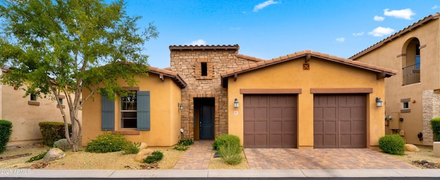 view of front of home with a garage