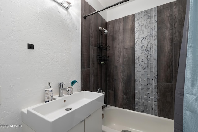 bathroom featuring vanity and shower / tub combo