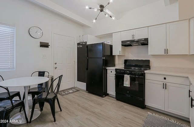 kitchen featuring white cabinetry, light hardwood / wood-style flooring, and black appliances