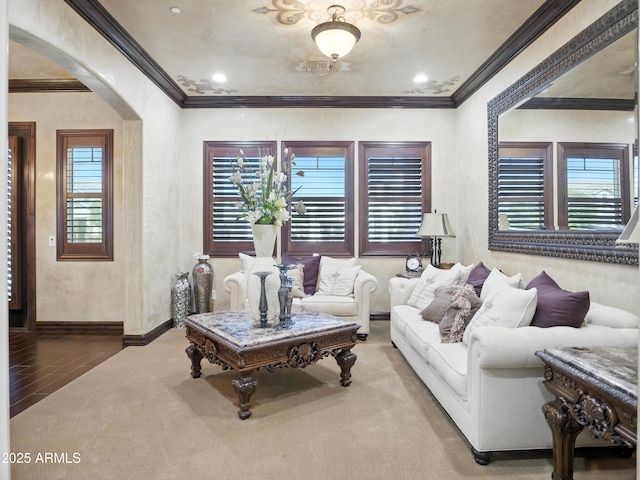 2822 E Constance Way, Phoenix, AZ 85042 - living room with crown molding, arched walkways, carpet floors, and wood finished floors