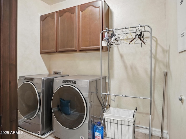 2822 E Constance Way, Phoenix, AZ 85042 - washroom featuring cabinet space and separate washer and dryer