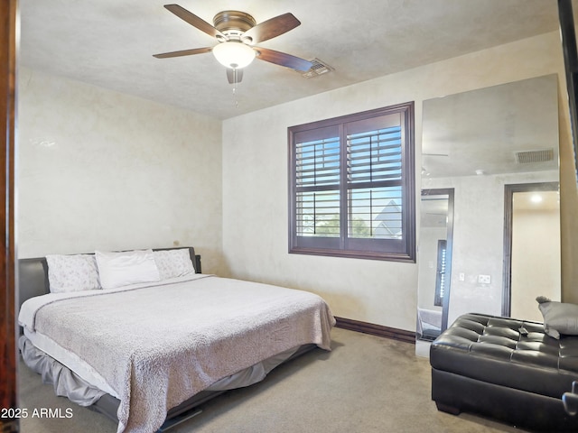 2822 E Constance Way, Phoenix, AZ 85042 - carpeted bedroom featuring baseboards and a ceiling fan