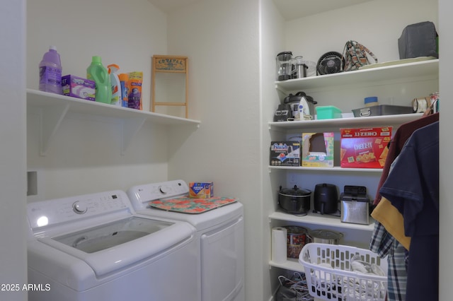 laundry room with laundry area and washer and clothes dryer