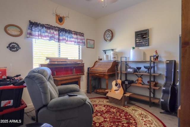 office area with light carpet and ceiling fan