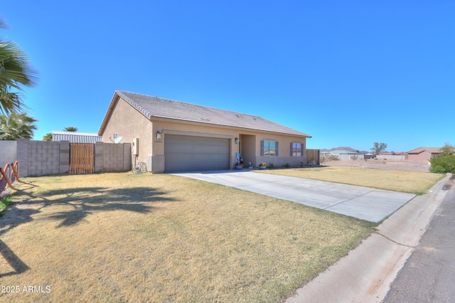 ranch-style house featuring a fenced front yard, driveway, an attached garage, and stucco siding