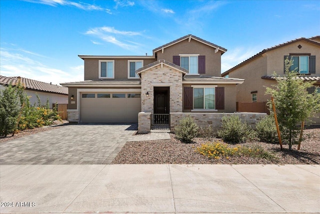 view of front of property with a garage