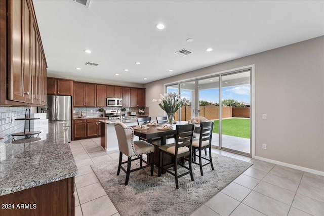 view of tiled dining area