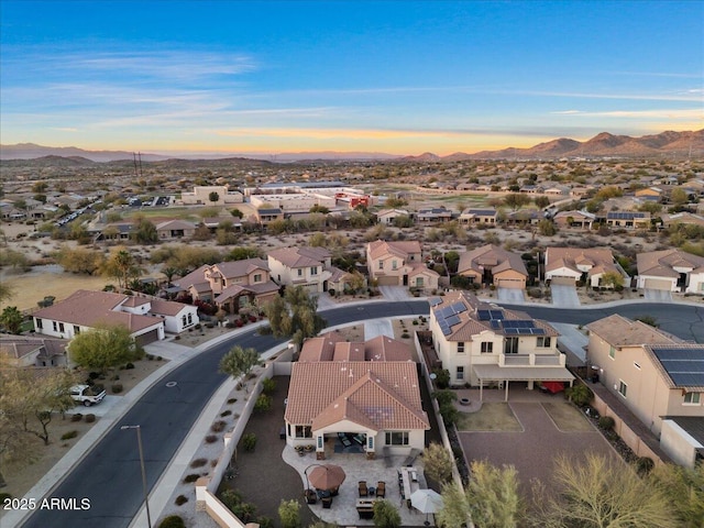 aerial view featuring a mountain view and a residential view