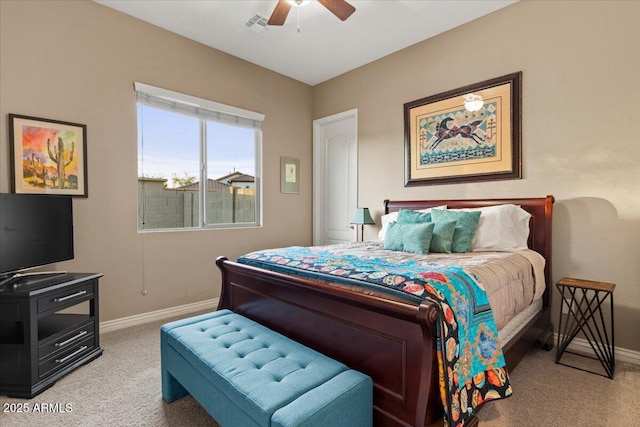 bedroom featuring visible vents, light carpet, and baseboards