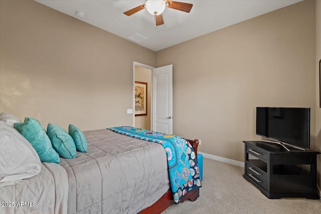 bedroom with a ceiling fan, visible vents, light carpet, and baseboards