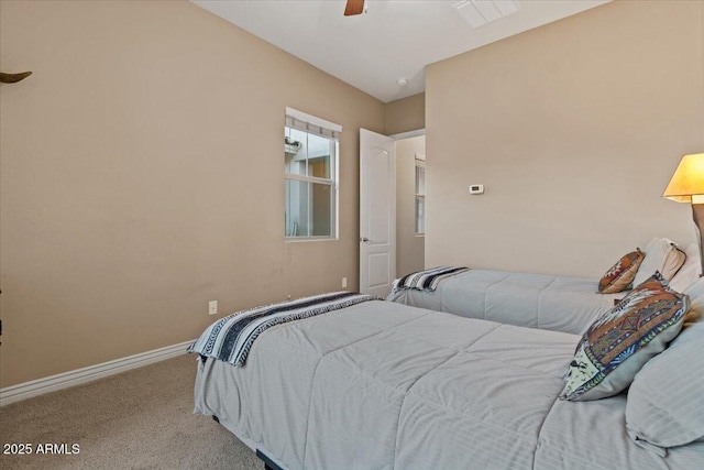 carpeted bedroom with ceiling fan, visible vents, and baseboards