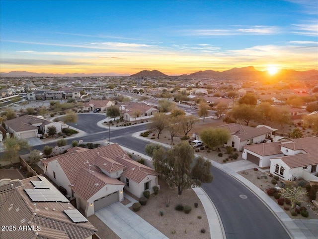 bird's eye view featuring a residential view and a mountain view