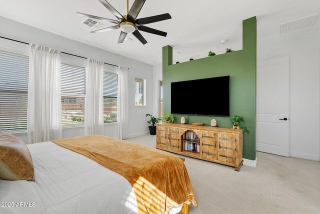 bedroom with baseboards, carpet, and ceiling fan